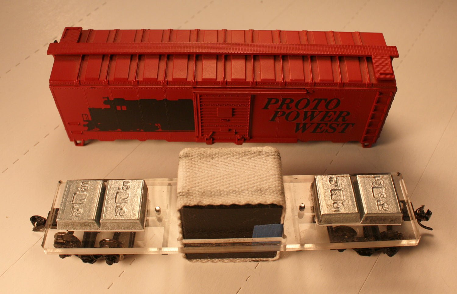 "SHINE-O-MATIC"       Brand New HO Track Cleaner Car (comes in complete kit form with - Kadee couplers and trucks with metal wheels) (Developed by A-Line) Fits Athearn or other 40' box cars