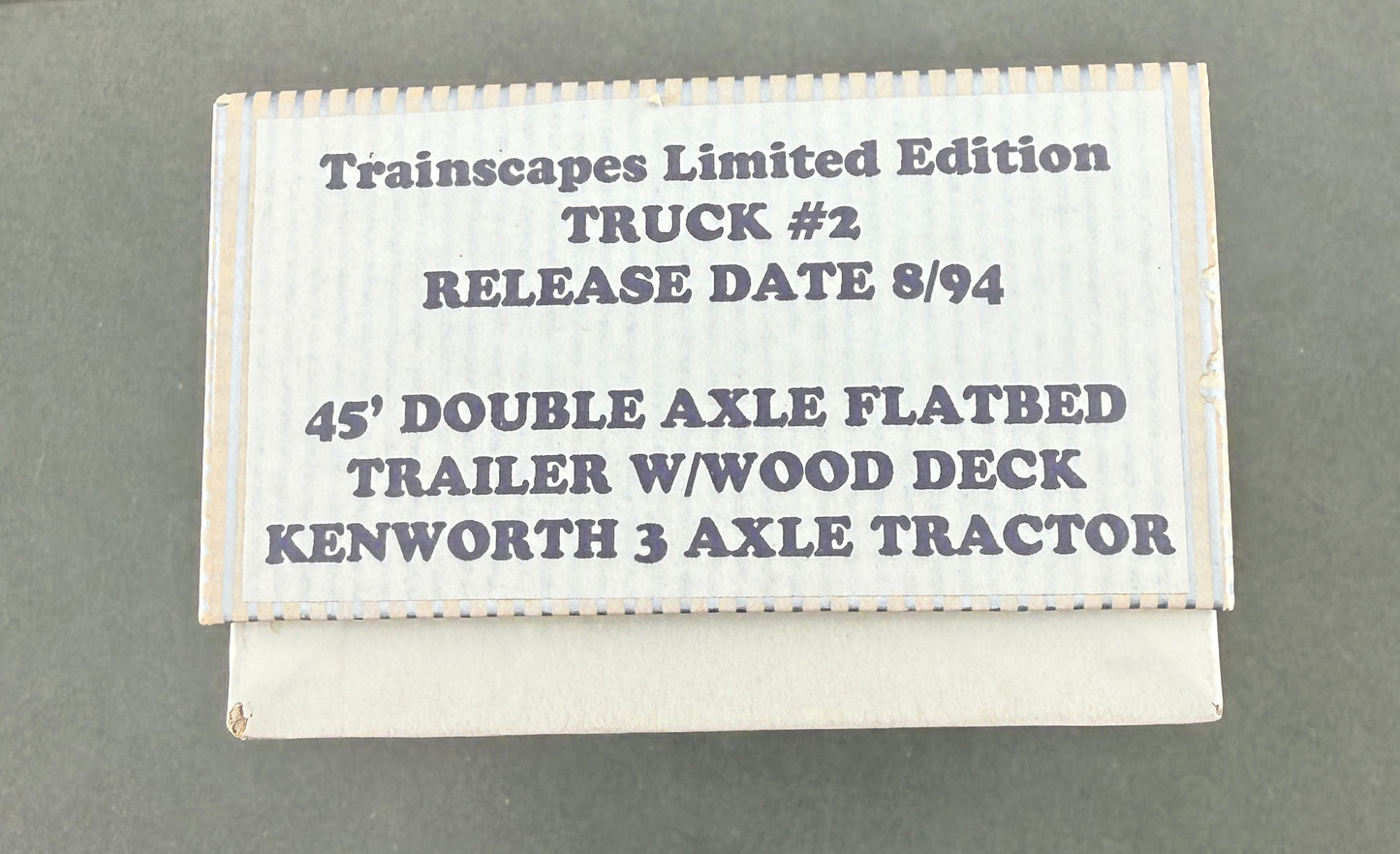 Trainscapes Limited Edition Truck #2 DBL Axle 45' Outside Frame Flatbed Trailer w/ 3 Axle KW Tractor 1 out of 50