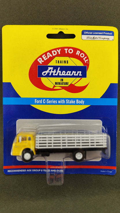 ATH 2727 HO Yellow Ford C Series With Stake Body
