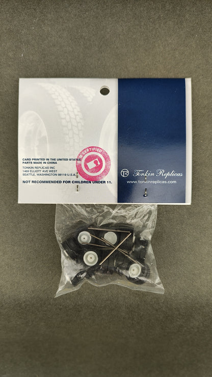 TS 736 	  	2-hole rear tractor or trailer white wheels, tires and axles (pkg-12)