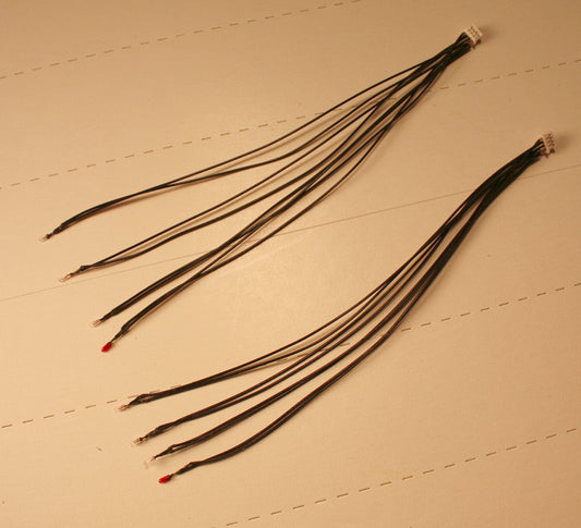 ATH 19023.10  clear & red light bulbs (pkg 2 sets) .050 dia. (1/16") X .100 long (3/32")