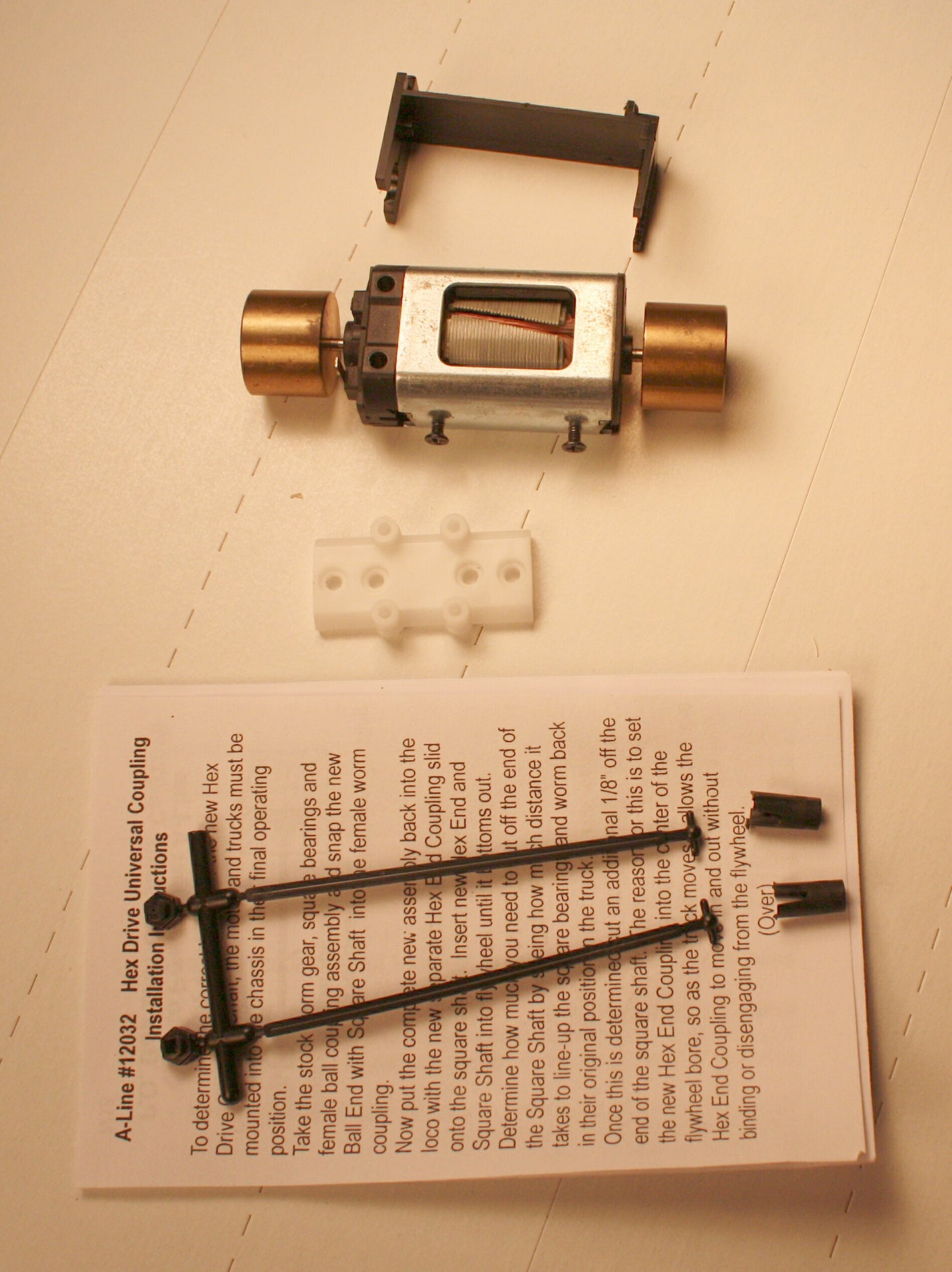 70323 - Athearn Genesis Can Motor with hex flywheels installed, 18x38  (includes a pair of #12032 Universal Hex Drive couplings)   Additional #12032 Hex couplings sold seperately