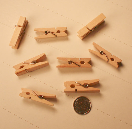 HT - 123    Mini Wood Clothespins (pkg - 20)