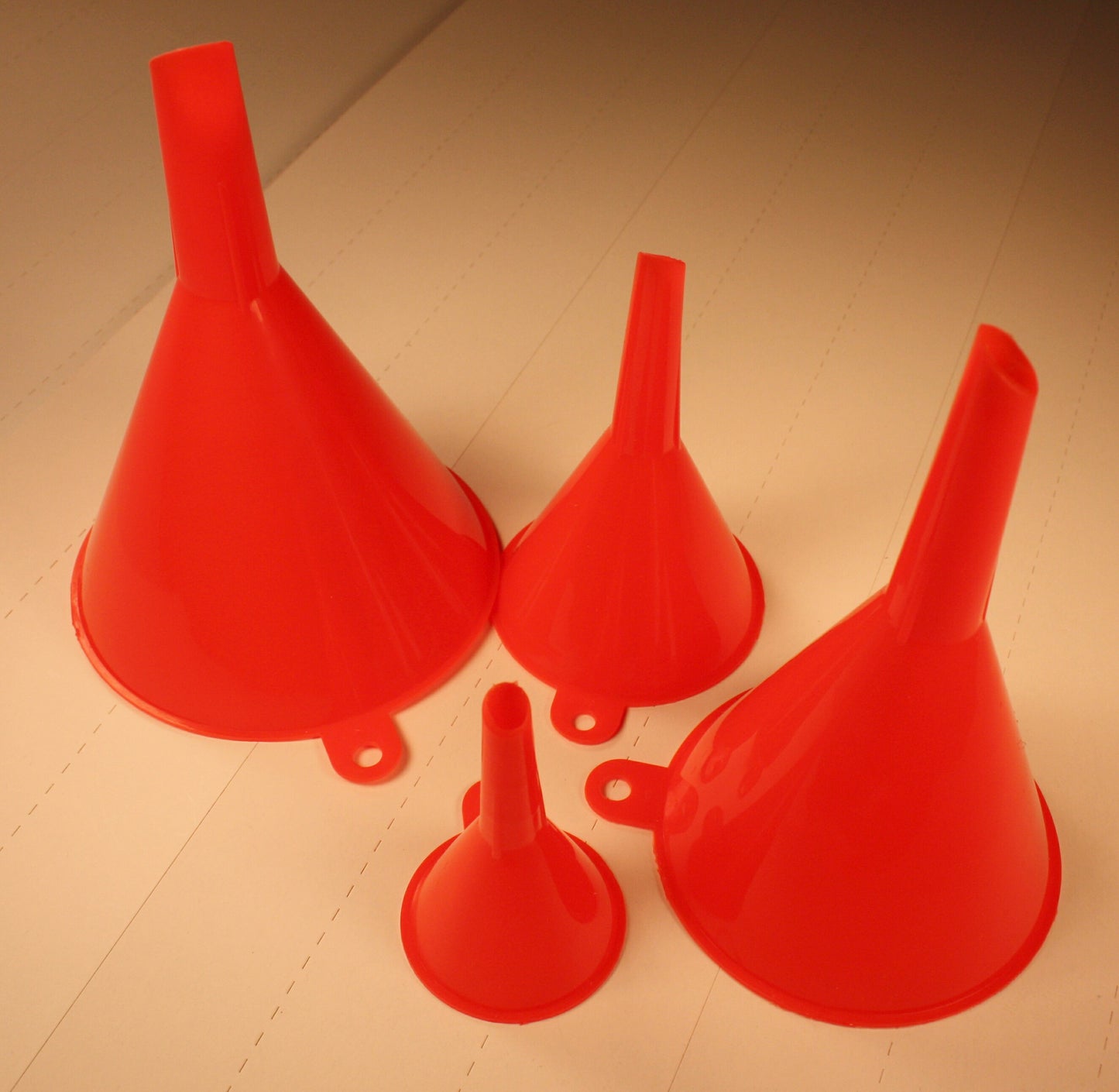 HT  112  Funnel 4 pc set sizes 4"  3.25" 2.5" 1.5" opening