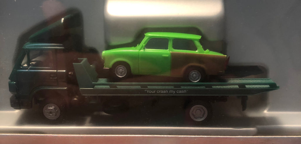 Pro-141239 - Promotex MAN F90 Car Transport Truck/Trailer - with green Trabant